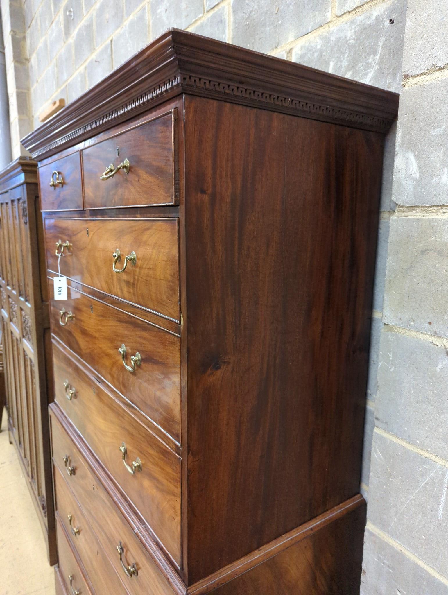 A George III mahogany chest on chest, width 111cm, depth 55cm, height 184cm